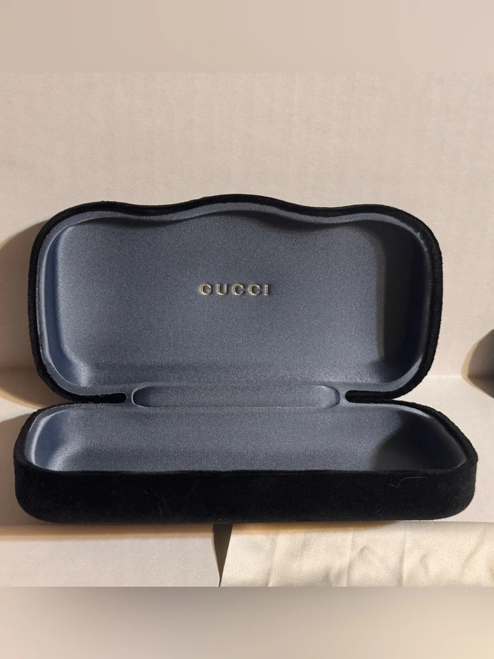 A Gucci Eyewear Case in Black and Dark Gray with Gold Logo